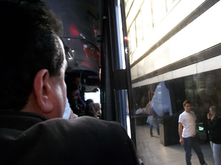 Man looks out bus in Buenos AIres