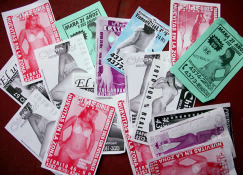 A picture of some of the flyers advertising sexual services in Buenos Aires