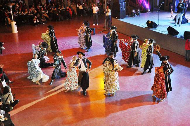 Argentine Folklore dancers on stage at the Cosquín National Follore Festival