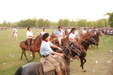 Argentine cowboys gather with their horses on Argentina's pampas in San Antonio de Areco. Check out Wander Argentina to arrange a stay or day trip to an estancia, or Argentine horse ranch 