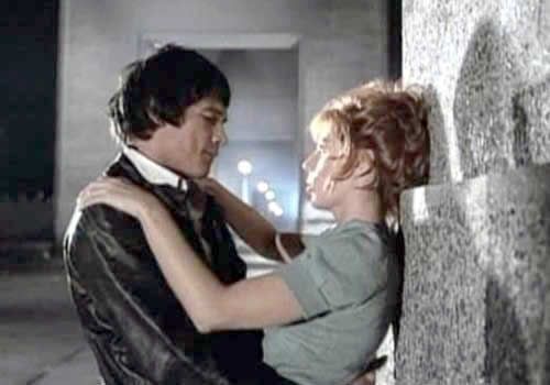 A screen shot of the Argnetine movie, La Mary staring Carlos Monzón and Susana Giménez
