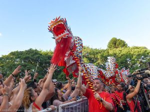 Performers doing the dragon dance during Chinese New Year Celebrations in Chinatown, Buenos Aires, Argentina