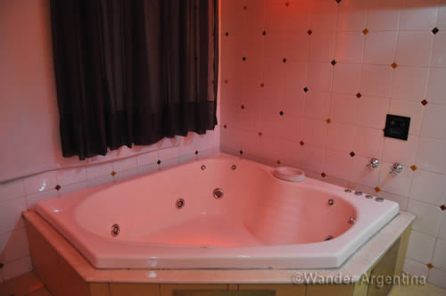 A jacuzzi in telo (Argentine sex hotel) room