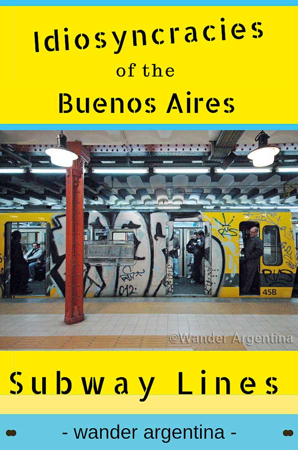 A picture of a graffitied Buenos Aires subway car in a subway station with the conductor hanging out the door and the words, 'Idiosyncracies of the Buenos Aires Subway lines' -Wander Argentina 