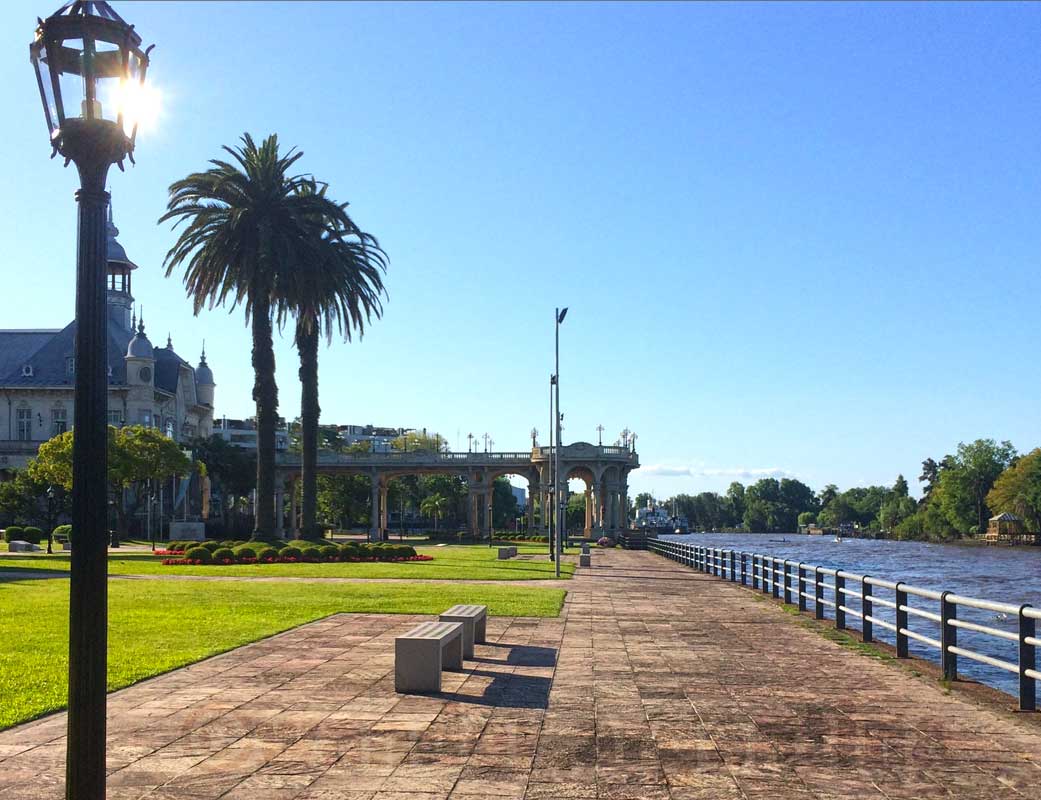 A promenade along the water with palm trees. Tigre Buenos AIres