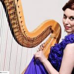 American musician, Sarah Stern with her harp