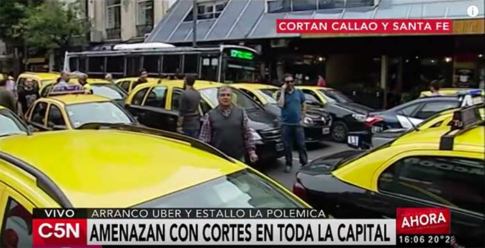 Taxi drivers stage a roadblock in Buenos Aires to protest Uber. 