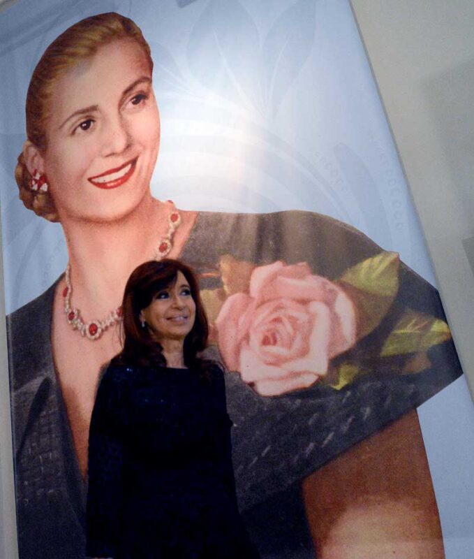 Cristina Fernández de Kirchner in front of a picture of Evita Perón 