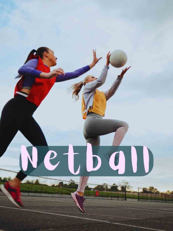 Two women playing Netball 